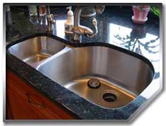 The beautiful brushed stainless steel finish makes this sink more than just utilitarian.